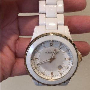White and gold watch